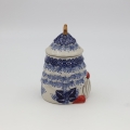 Ceramic container Gnome Christmas tree with lid A523 D108 – hand-painted Bolesławiec pottery in the shape of a gnome and Christmas tree, decorative and practical for storage.