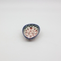 Hand-painted ceramic spoon rest from Bolesławiec pottery.