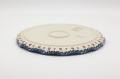 Detail of hand-painted decoration on Boleslawiec FALA ceramic platter.
