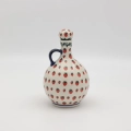 Hand-painted large kitchen utensil holder made from traditional Bolesławiec pottery. Perfect for storing spoons, spatulas, and kitchen accessories.