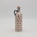 Hand-painted striped teapot made from traditional Bolesławiec pottery. A stylish and functional piece perfect for serving tea and decorating the kitchen.