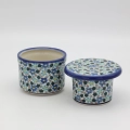 Hand-painted water butter dish made from traditional Bolesławiec pottery. A practical kitchen accessory designed to keep butter fresh and spreadable longer.