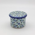 Hand-painted water butter dish made from traditional Bolesławiec pottery. A practical kitchen accessory designed to keep butter fresh and spreadable longer.