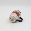 Hand-painted BEL mug made from traditional Bolesławiec pottery. A stylish mug perfect for coffee, tea, and everyday use.