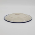 Elevate your dining experience with the ANDY collection dinner plate. This 26 cm flat plate is a centerpiece of any tableware set, merging centuries of Bolesławiec pottery tradition with premium craftsmanship.