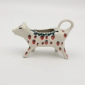 This unique piece was crafted from the highest quality stoneware and hand-decorated using the traditional stamping method, which guarantees that every single item possesses its own unique character and soul.