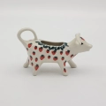 This unique piece was crafted from the highest quality stoneware and hand-decorated using the traditional stamping method, which guarantees that every single item possesses its own unique character and soul.