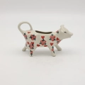 The 100 ml capacity is perfectly measured for serving cream or milk for several people, while the precisely shaped cow's mouth allows for easy pouring without spilling a drop on the tablecloth.
