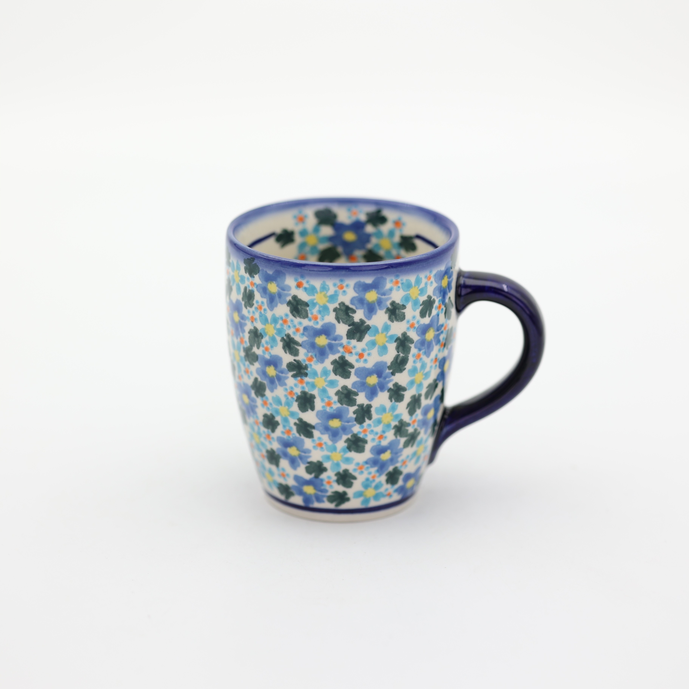 Mug BEL A38 D134 – hand-painted Bolesławiec pottery in a traditional pattern, practical and decorative for everyday use.