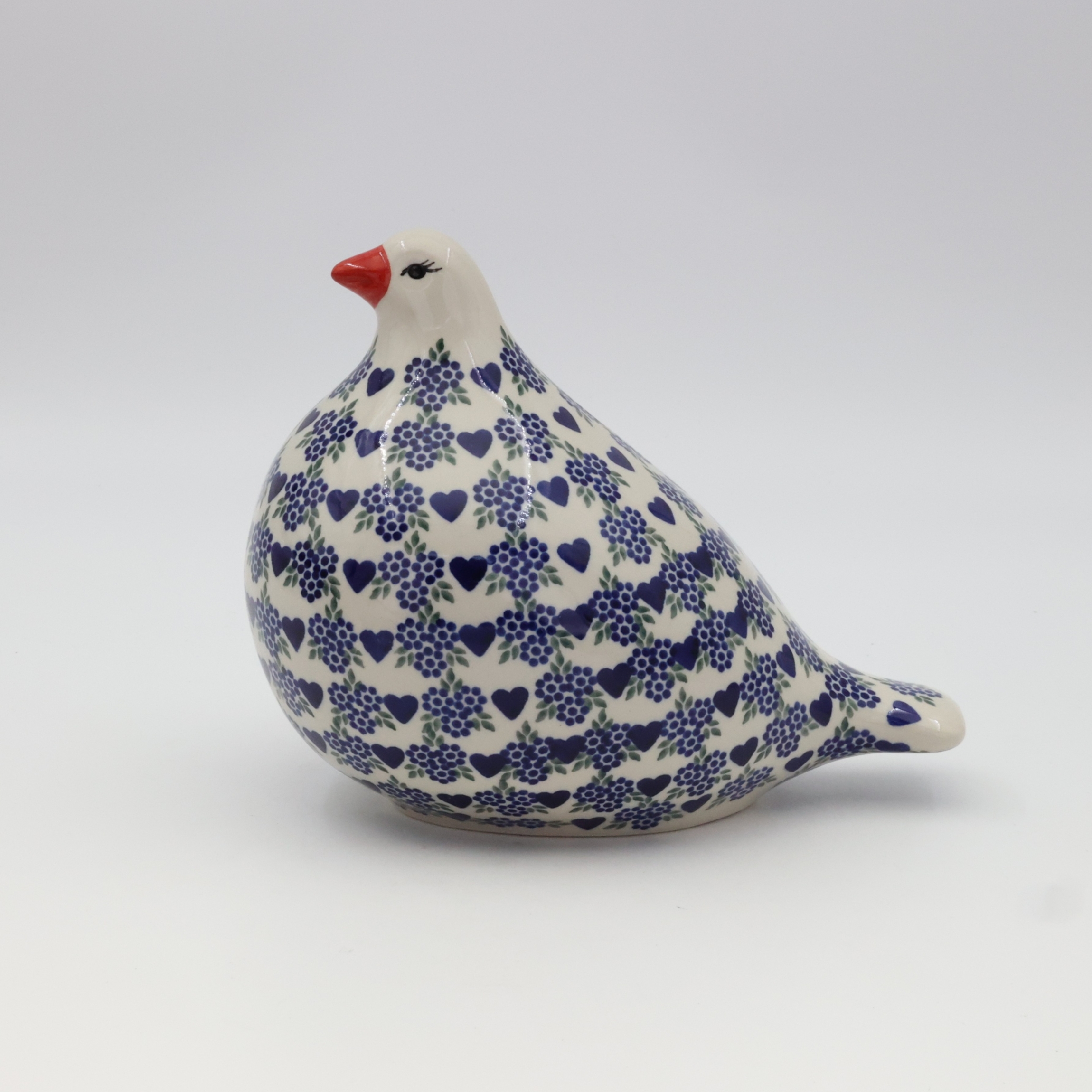 Hand-painted Bolesławiec ceramic pigeon figurine.