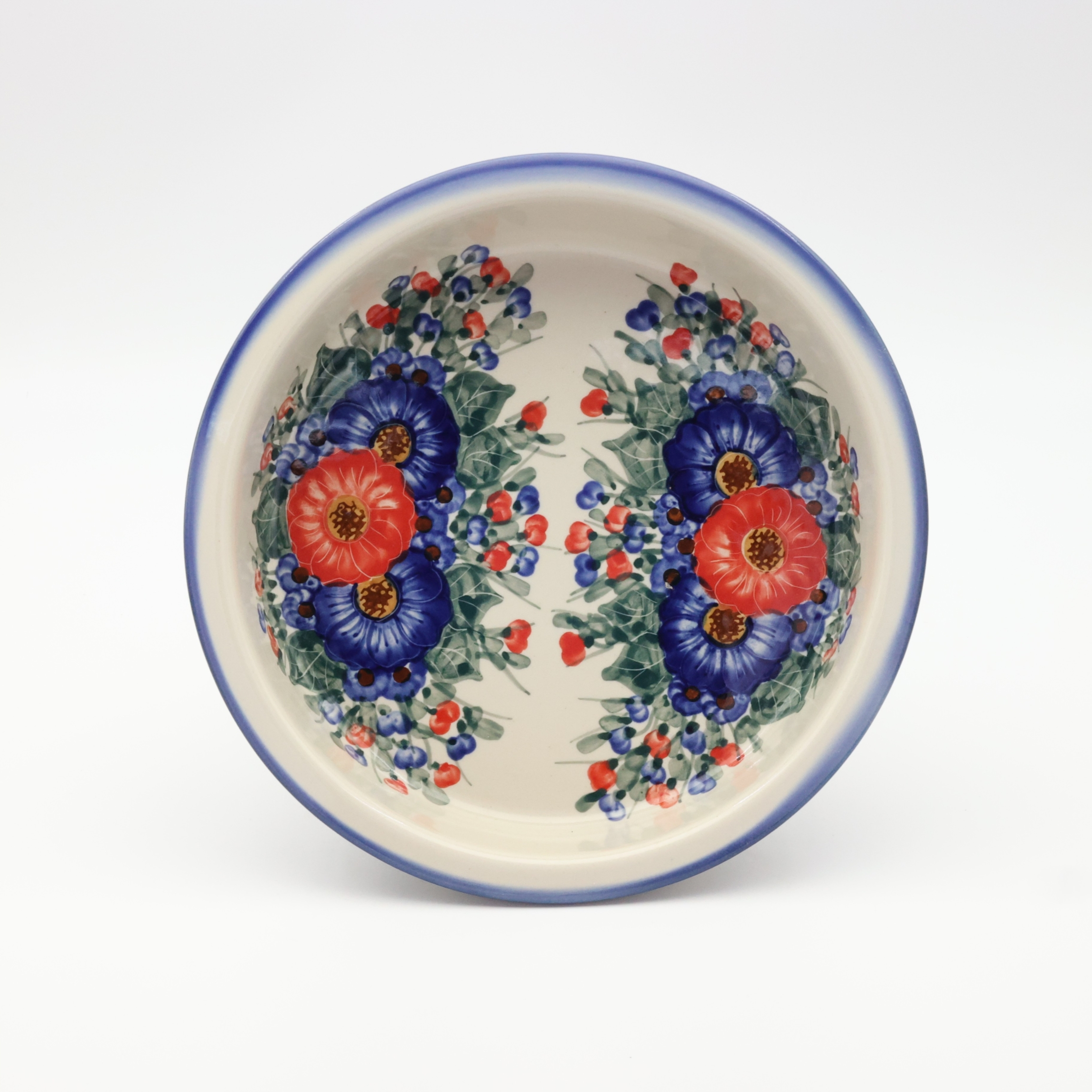 Okrągłe ceramiczne naczynie do zapiekania z Bolesławca, ręcznie zdobiona ceramika bolesławiecka, polskie rękodzieło artystyczne do piekarnika, mikrofalówki i zmywarki.