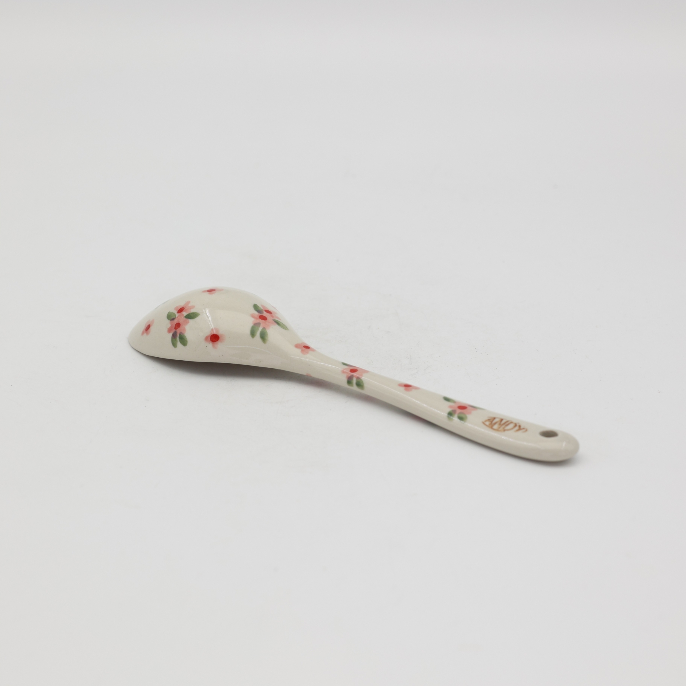 This large ceramic spoon is perfect for serving dishes, stirring meals, or adding a unique touch to your kitchen décor.